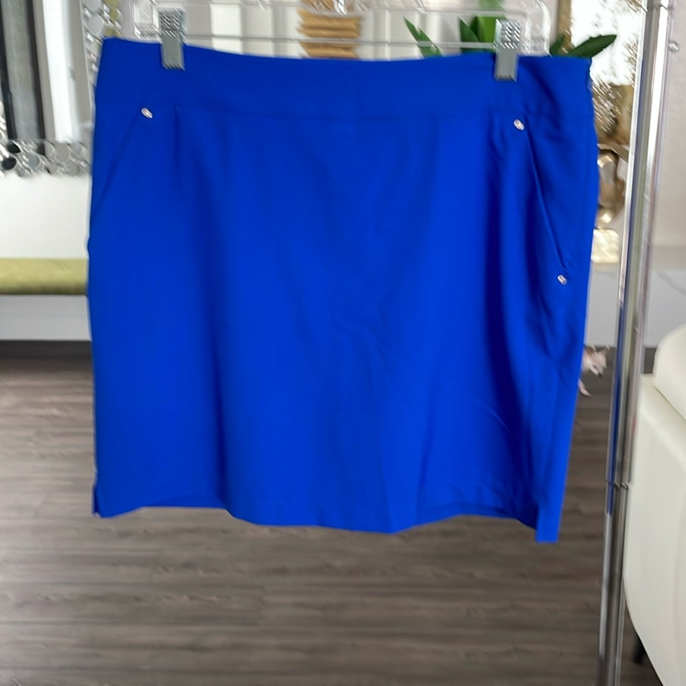 Greg Norman sports skort